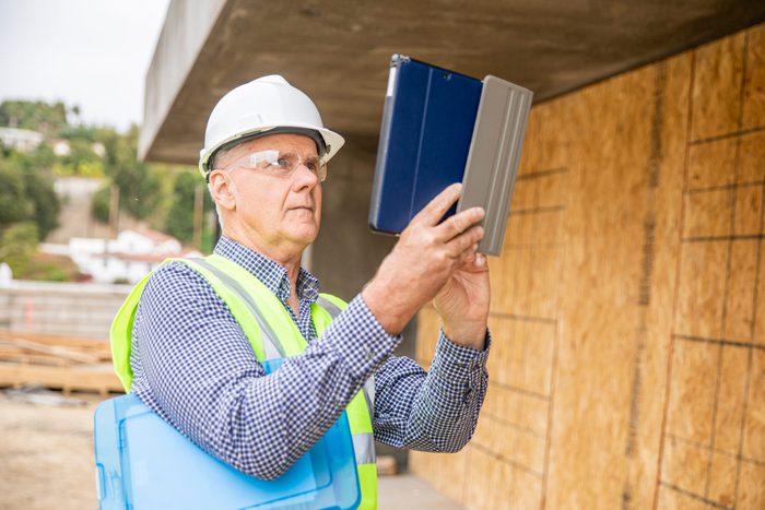 Construction Inspector Photographing