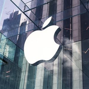 Glass building of the Apple Store with huge Apple Logo